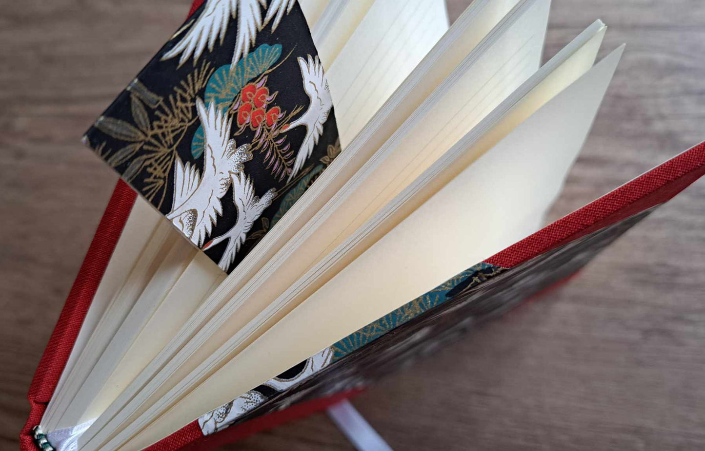 A5 Journal/Notebook (lined) - red cloth bound with black and white Japanese cranes design front cover