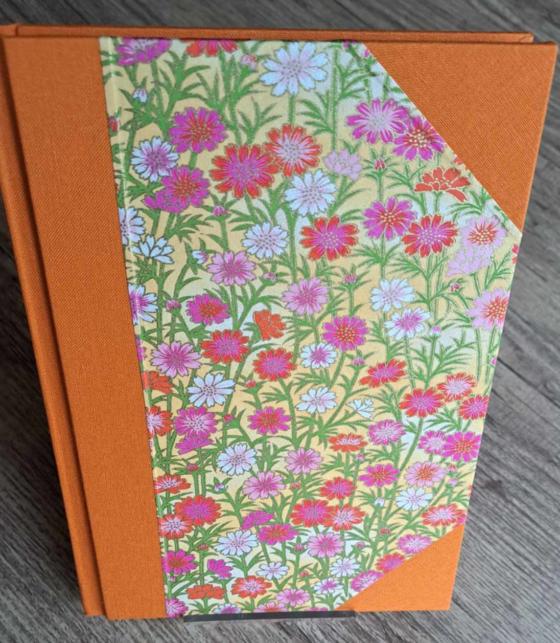 A5 Journal/Notebook (blank) - orange cloth bound with pink floral design front cover