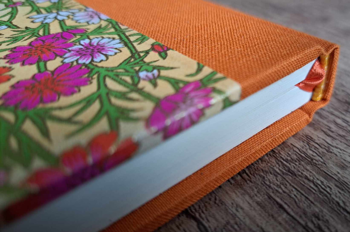 A5 Journal/Notebook (blank) - orange cloth bound with pink floral design front cover