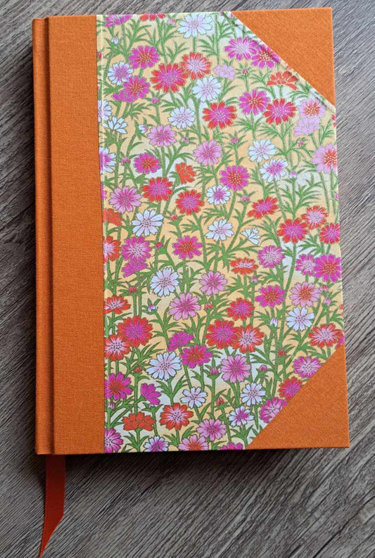 A5 Journal/Notebook (blank) - orange cloth bound with pink floral design front cover