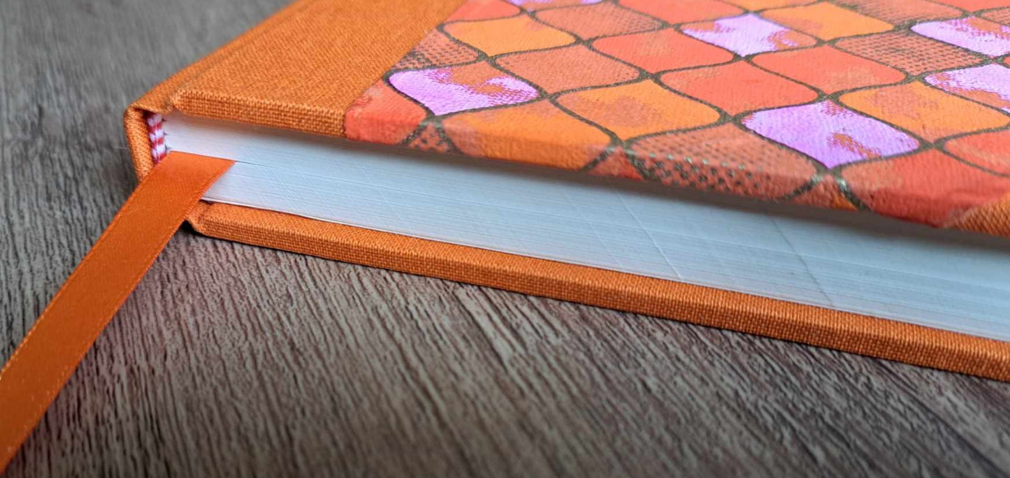 A5 Journal/Notebook (blank) - orange cloth bound with orange and pink geometric design front cover