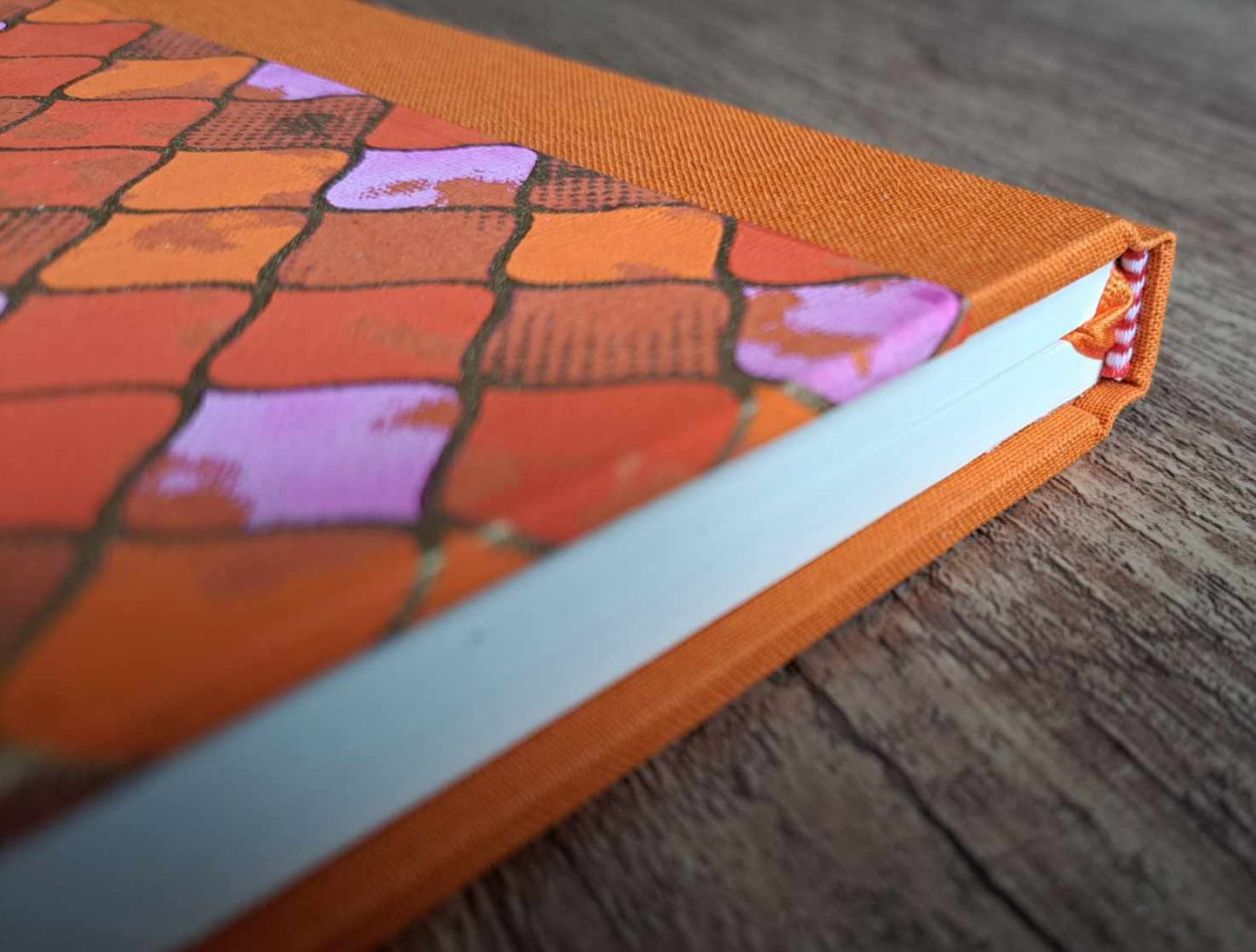 A5 Journal/Notebook (blank) - orange cloth bound with orange and pink geometric design front cover