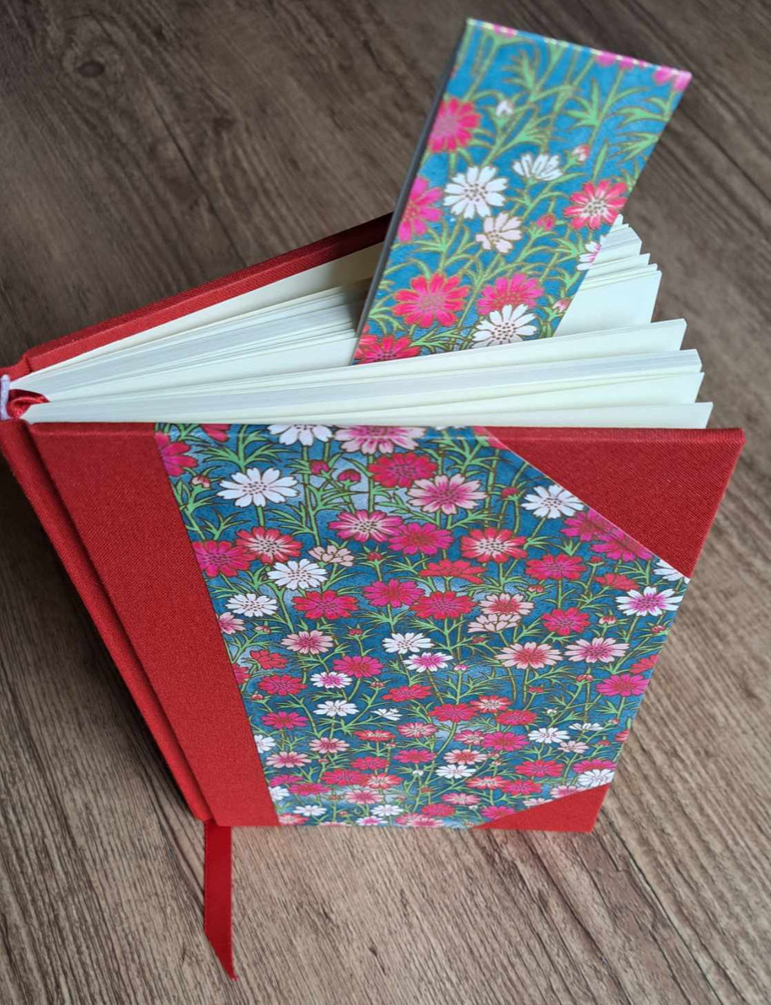 A5 Journal/Notebook (blank) - red cloth bound with pink blossom design front cover