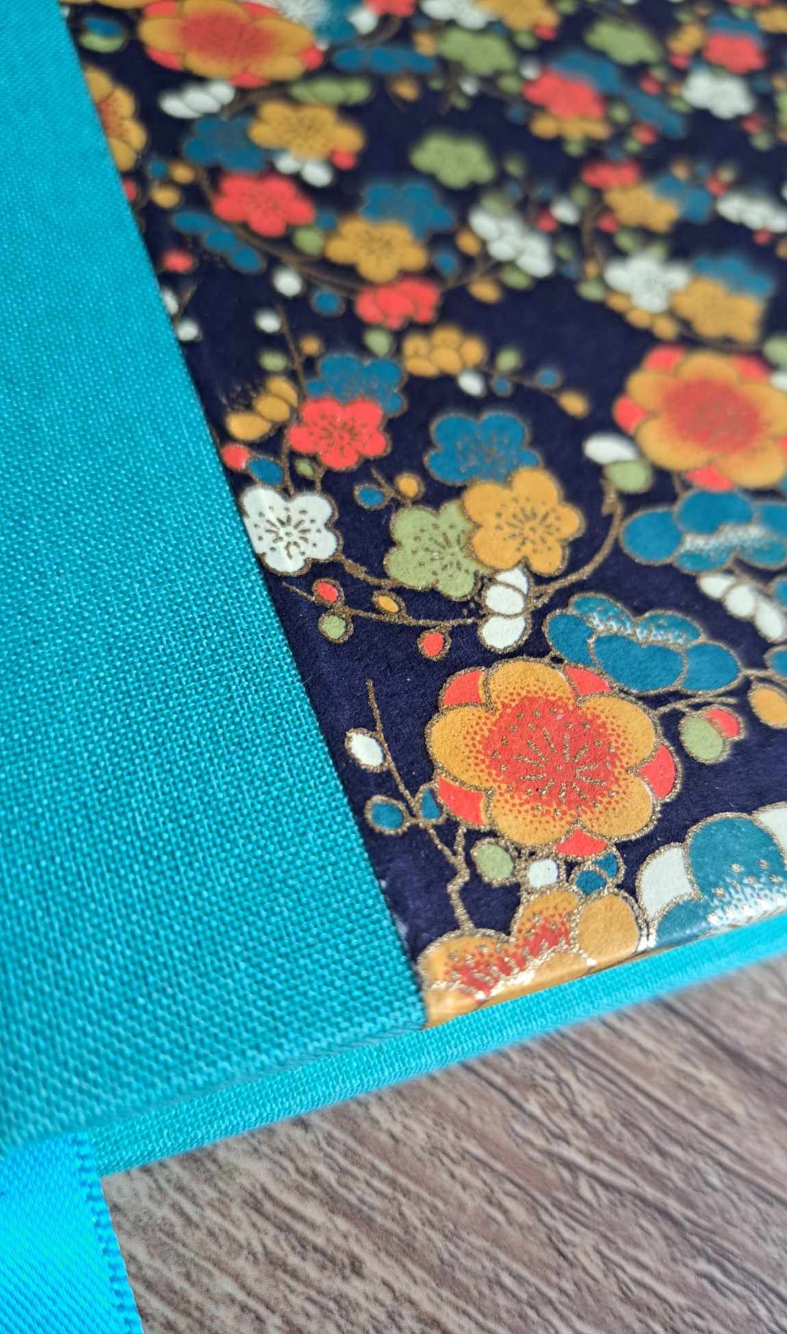 A5 Journal/Notebook (blank) - turquoise cloth bound with orange and blue blossom design front cover