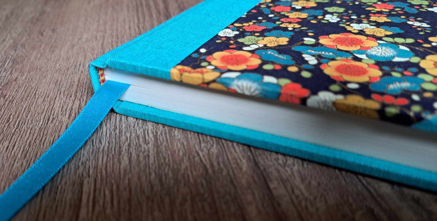 A5 Journal/Notebook (blank) - turquoise cloth bound with orange and blue blossom design front cover