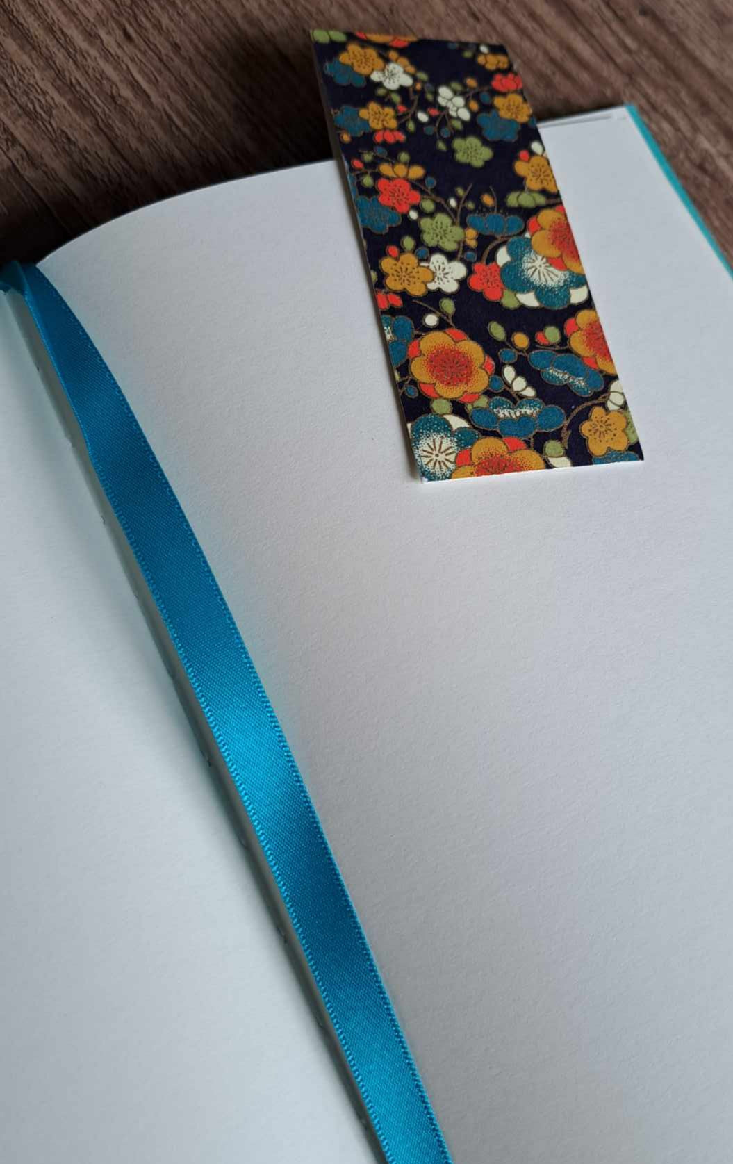 A5 Journal/Notebook (blank) - turquoise cloth bound with orange and blue blossom design front cover