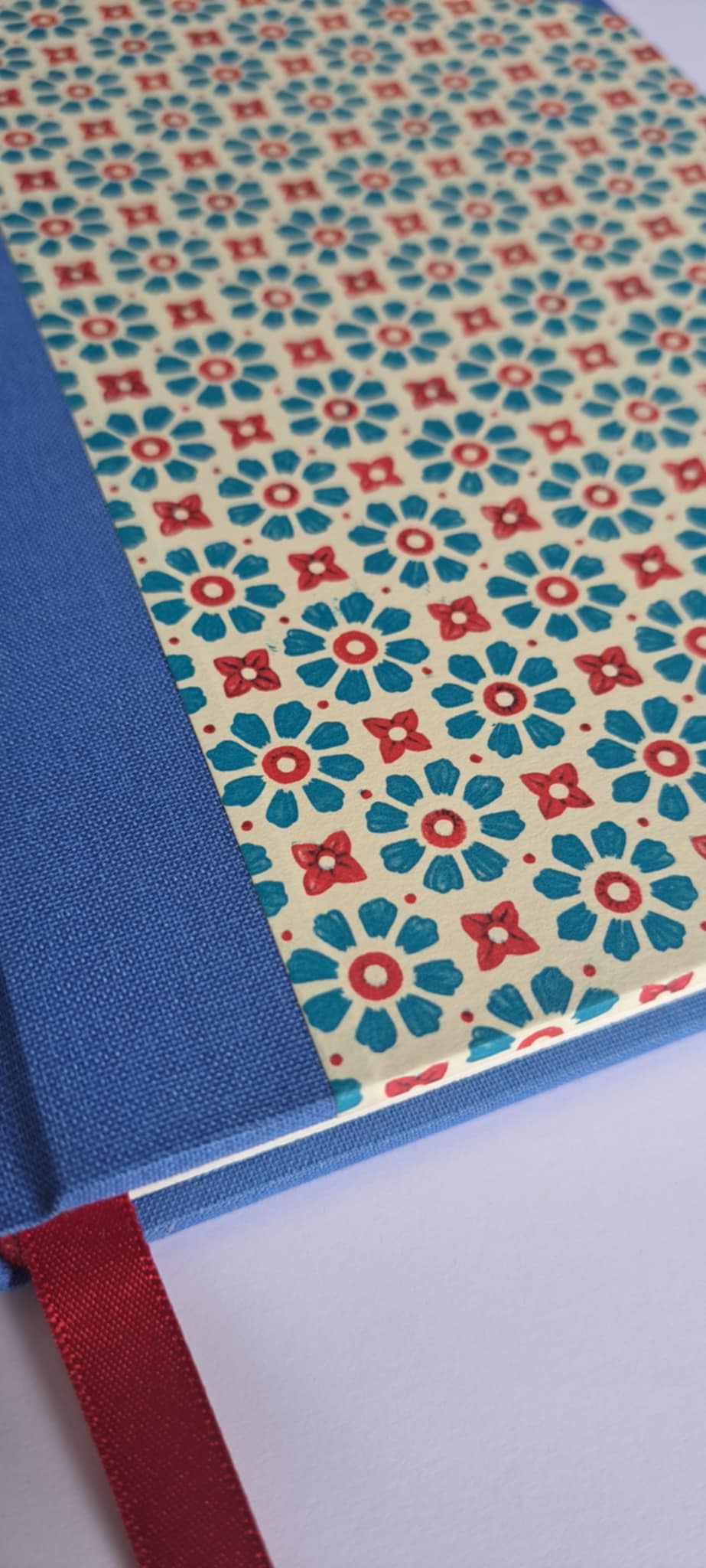 A5 Journal/Notebook (lined) - blue cloth bound with geometric floral design front cover