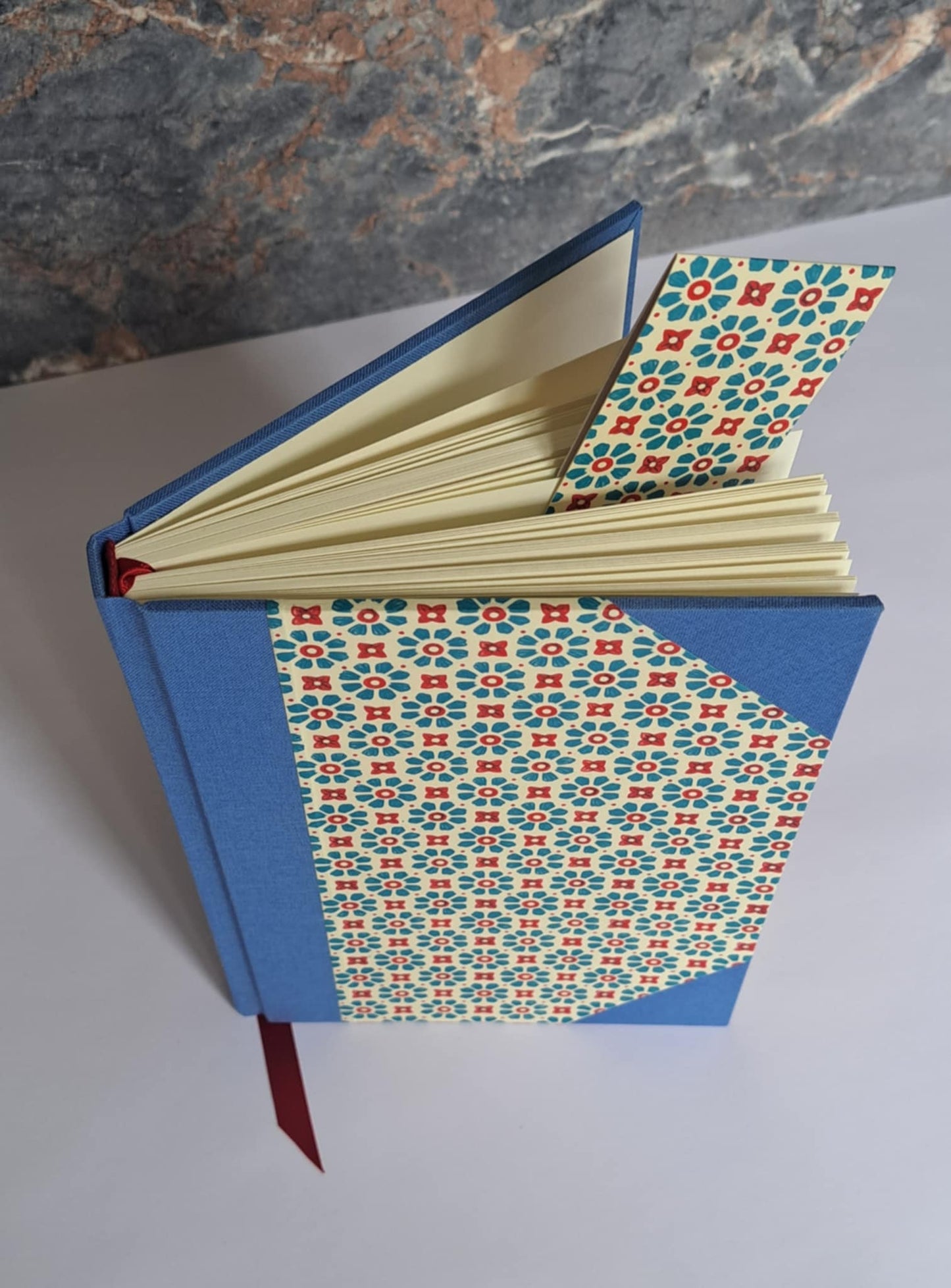 A5 Journal/Notebook (lined) - blue cloth bound with geometric floral design front cover