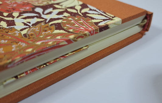 A5 Journal/Notebook (blank) - rust cloth bound with gold and cream floral design front cover