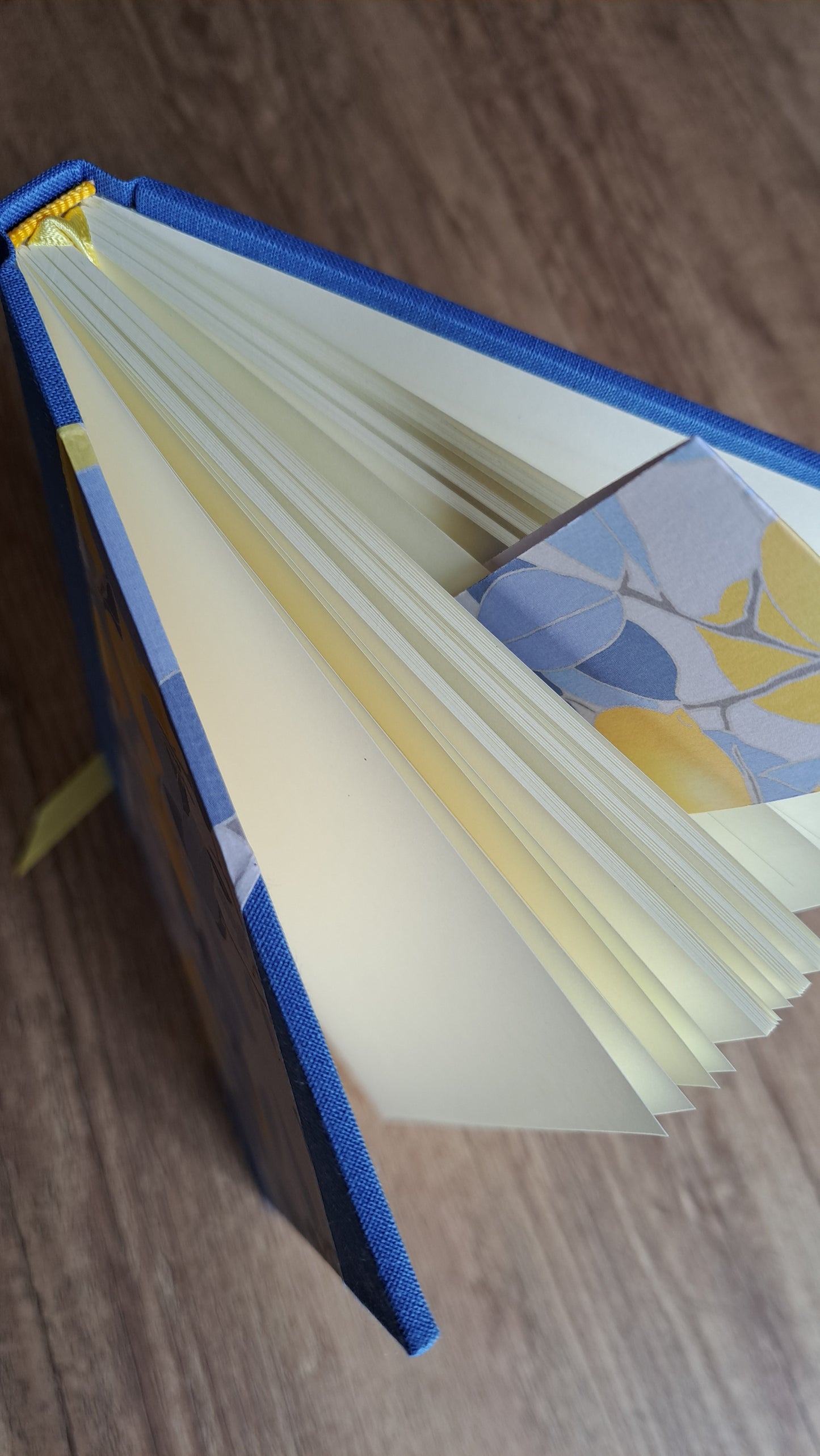 A5 Journal/Notebook (lined) - blue cloth bound with blue and yellow leaf design front cover