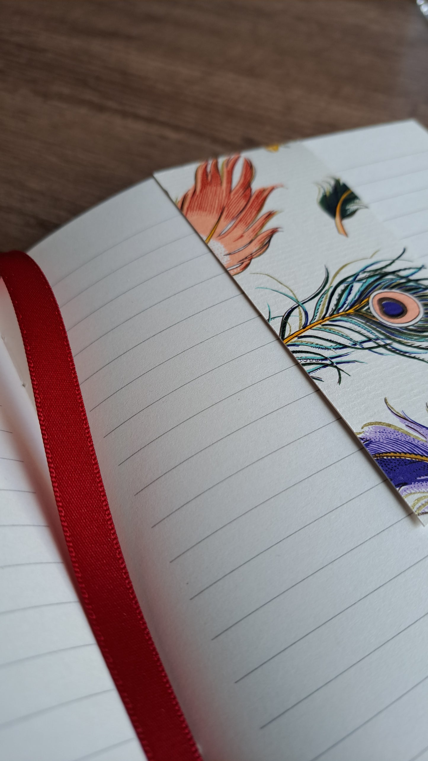 A5 Journal/Notebook (lined) - red cloth bound with peacock design front cover