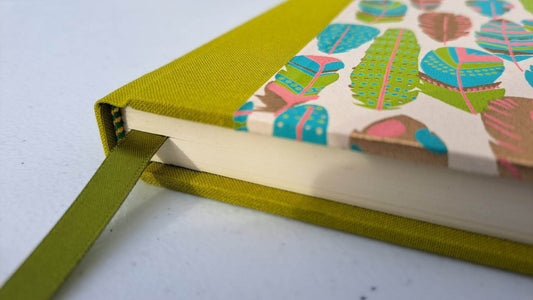 A5 Journal/Notebook (lined) - lime cloth bound with turquoise feather design front cover